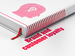 Image showing Marketing concept: book Head With Light Bulb, Brand and Customer loyalty on white background