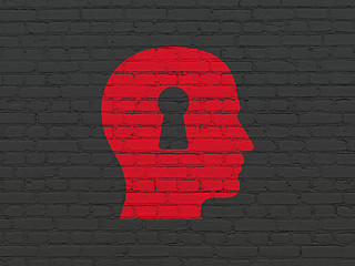 Image showing Advertising concept: Head With Keyhole on wall background