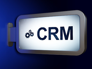 Image showing Business concept: CRM and Gears on billboard background