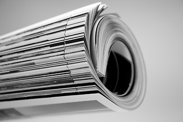 Image showing rolled up magazine