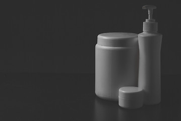 Image showing Group of cosmetic bottles isolated on white