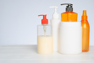 Image showing Group of cosmetic bottles isolated on white