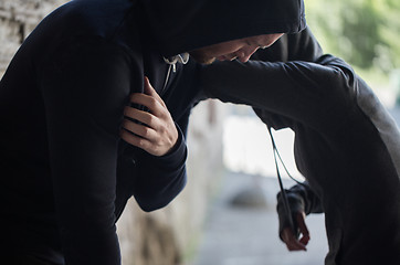 Image showing close up of addicts on street