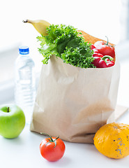 Image showing close up of bag with friuts, vegetables and water