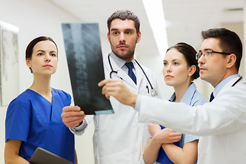 Image showing group of medics with spine x-ray scan at hospital