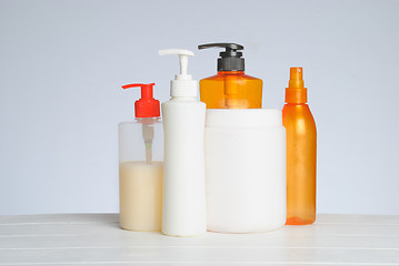 Image showing Group of cosmetic bottles isolated on white