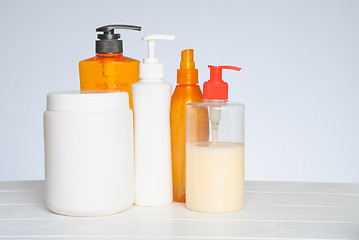 Image showing Group of cosmetic bottles isolated on white