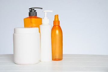 Image showing Group of cosmetic bottles isolated on white