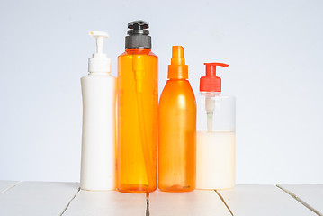 Image showing Group of cosmetic bottles isolated on white