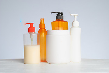 Image showing Group of cosmetic bottles isolated on white