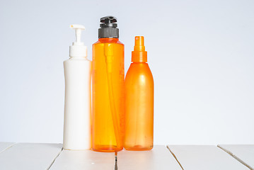 Image showing Group of cosmetic bottles isolated on white