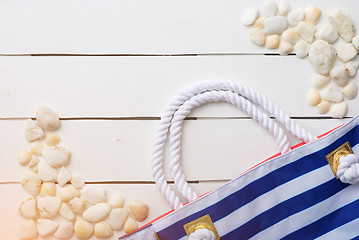 Image showing beach accessories on wooden board