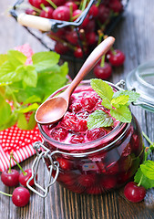 Image showing cherry jam and berries