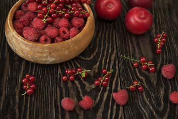 Image showing Fresh berries on wooden table