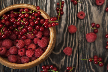 Image showing Fresh berries on wooden table