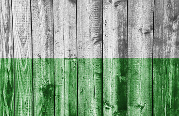 Image showing Flag on weathered wood