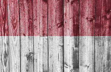 Image showing Flag on weathered wood