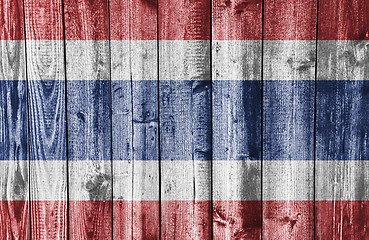 Image showing Flag on weathered wood