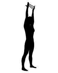 Image showing Silhouette of woman doing exercises