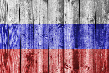 Image showing Flag on weathered wood