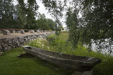 Image showing old boat and bridge