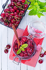 Image showing cherry jam and berries