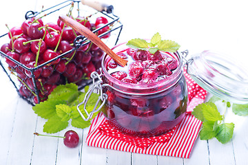 Image showing cherry jam and berries