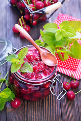 Image showing cherry jam and berries