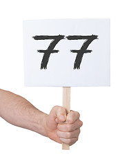 Image showing Sign with a number, 77