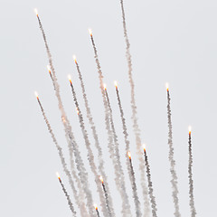 Image showing Flares with a trial of smoke