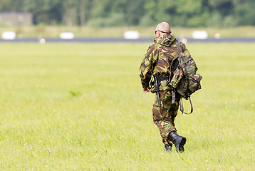 Image showing LEEUWARDEN, THE NETHERLANDS - JUNE 9; Military guard walking at 