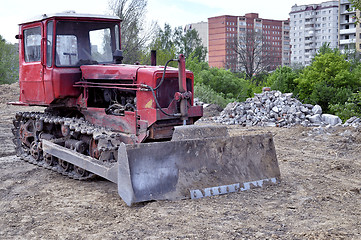 Image showing Old caterpillar bulldozer working on construction site