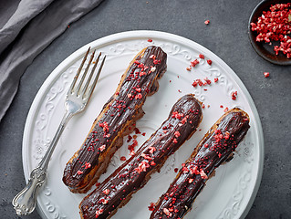 Image showing freshly baked chocolate eclairs