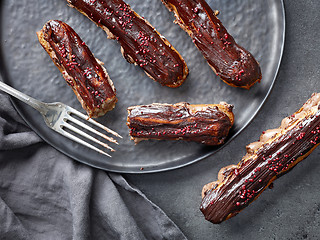 Image showing freshly baked chocolate eclairs