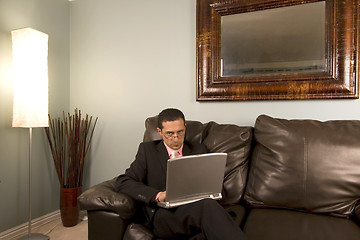 Image showing Home or Office - Businessman Working on the Couch