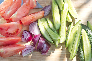 Image showing cut vegetables on board