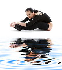 Image showing fitness in black leotard on white sand #2