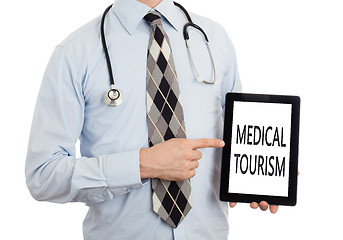 Image showing Doctor holding tablet - Medical tourism