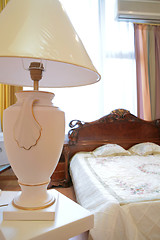 Image showing antique lamp in luxurious bedroom