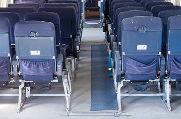 Image showing Empty old airplane seats in the cabin, selective focus