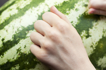 Image showing hand on watermelon