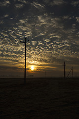 Image showing power poles in the field