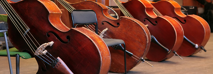 Image showing four old bass viols