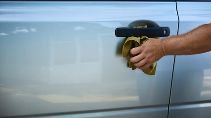 Image showing Close-up Of Hand With green Brush Washing Car