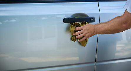 Image showing Close-up Of Hand With green Brush Washing Car