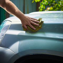 Image showing Close-up Of Hand With green Brush Washing Car