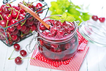 Image showing cherry jam and berries