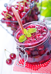 Image showing cherry jam and berries