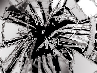 Image showing Shattered or broken glass Pieces isolated on black