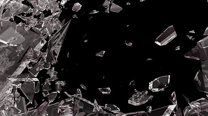 Image showing Pieces of shattered glass isolated on black